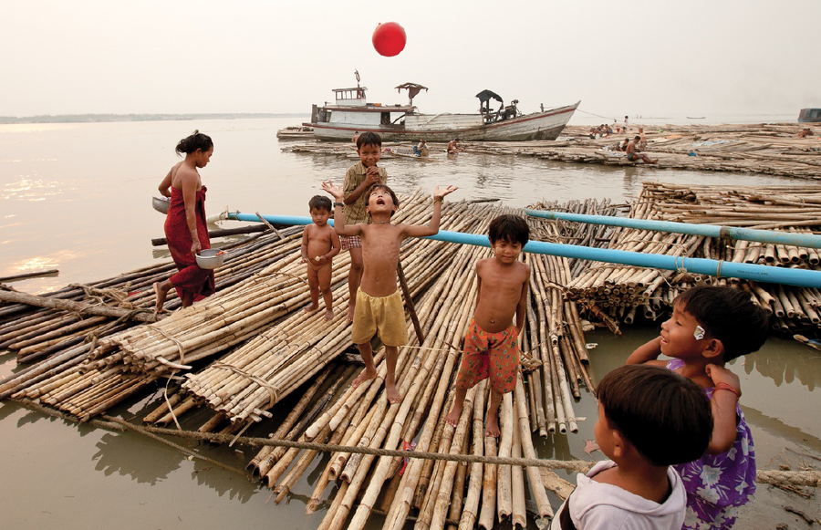 explore_earth_irrawaddy_river_raft_village_shot.png