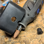 hardware_adding_a_power_jack_to_a_battery_powered_dremel_charger_base_hole_drilled.png