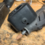 hardware_adding_a_power_jack_to_a_battery_powered_dremel_charger_base_power_jack_fitted.png