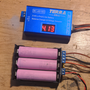hardware_creating_an_analog_rc_drone_with_remote_headset_batteries_and_charger.png