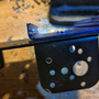 hardware_creating_an_analog_rc_drone_with_remote_headset_mounting_the_charger.png