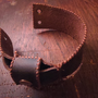 leatherworking_creating_a_tooling_bracelet_with_prayer_beads_stitching_rework_final_result.png