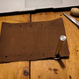 leatherworking_creating_motorcycle_handlebar_tassels_adding_grommets.png