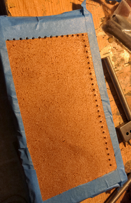 leatherworking_leather_sleeves_for_mobile_devices_punched_stitching_holes.png