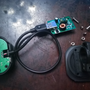 vehicles_e-scooters_crony_dk-10_drilling_holes_through_usb_mount_and_hub_lid.png